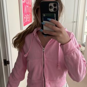 Brandy Melville bright pink cropped zip up hoodie. Size small